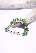 Load image into Gallery viewer, happy crystal bracelet on white wooden branch