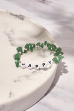Load image into Gallery viewer, happy bracelets on white marble background